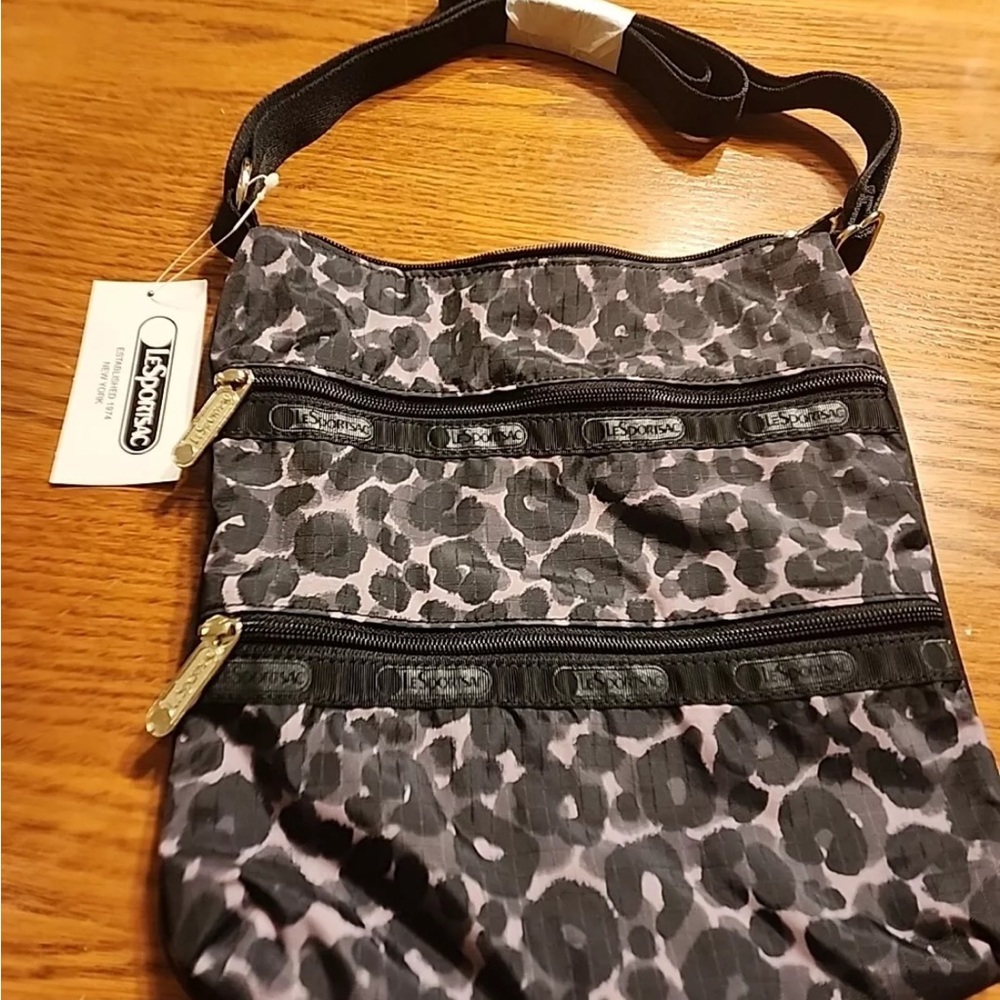 LeSportsac crossbody Kylie 3 zipper cheetah black bag. New